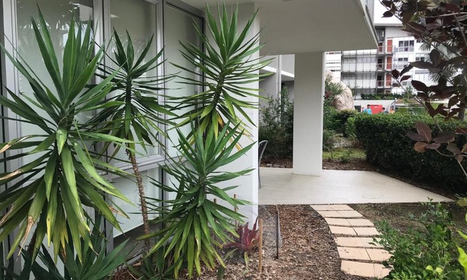 Nelly Bay Apartment | Discover Euodia Unit 1102: Oceanfront Retreat with Spa