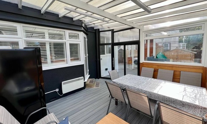 Clayhall Apartment | Unique 3-Bed Garden Apartment with BBQ & Sauna Experience
