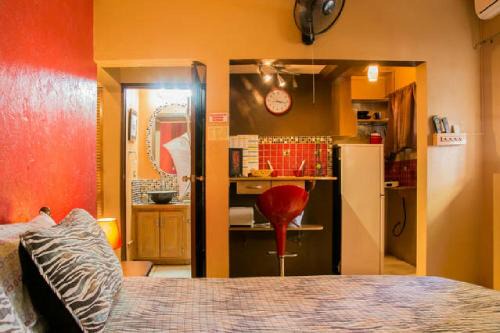 Saint Andrew Apartment | Experience Comfort at One32 Guesthouse Red Velvet