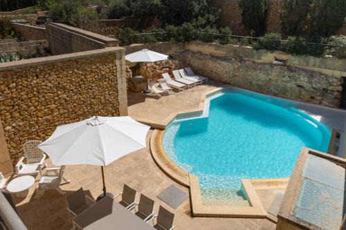 Xaghra House | Relax at OneFifty Holiday Home with Oceanfront Pool Access