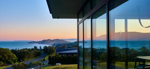 Okitu House | Explore ONYX HOUSE - Family-Friendly Retreat at Wainui Beach