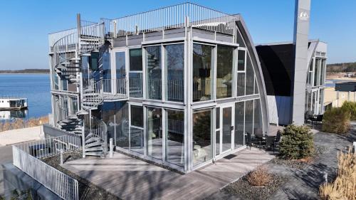 Geierswalde Apartment | Experience Serenity at Open-Water Resort with Ocean Views