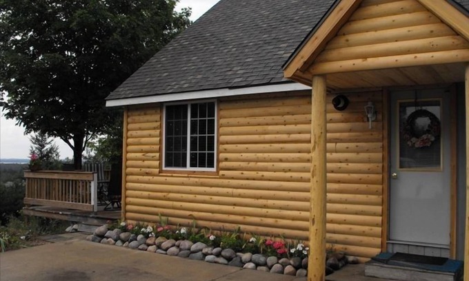 Rapid City Ski Chalet | Secluded Lake View Hotel with Hot Tub & 9.6/10 Rating