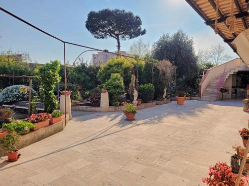 Torre Annunziata Apartment | Discover Oplontis' Garden: Family-Friendly Stay Near Pompeii