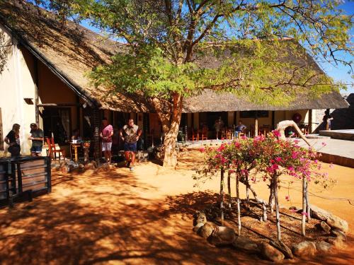 Kamanjab Cabin | Inviting Stay at Oppi-Koppi Rest Camp with Pool and Breakfast