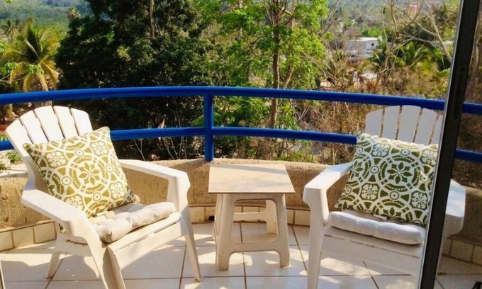 La Manzanilla Villa | Scenic Orange Apartment with Ocean and Mountain Views