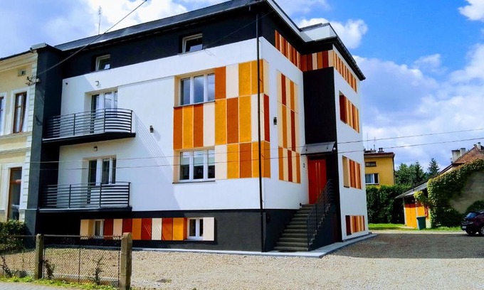 Wadowice Apartment | Child-Friendly Orange Apartment with Outstanding 9.2 Rating