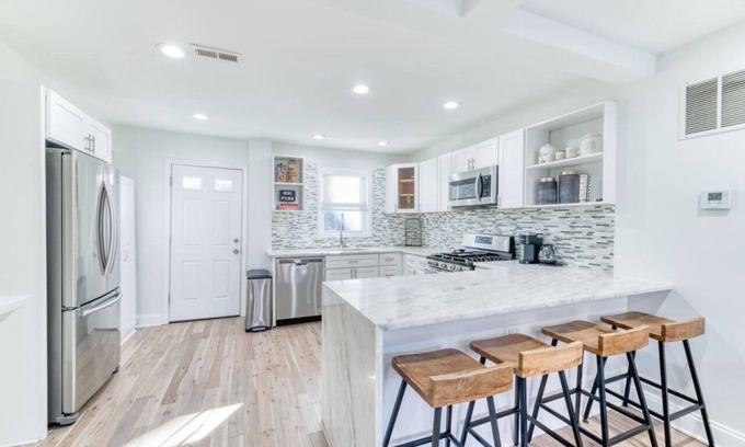 Anacostia House | Modern Design at Orange Door Abode with Spa & Pet-Friendly Perks