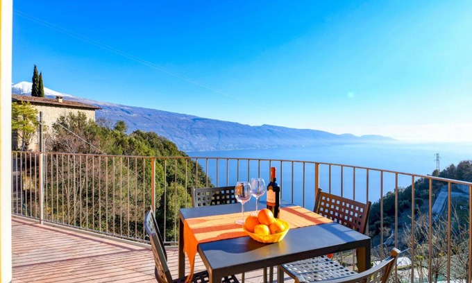 Tignale Apartment | Welcoming Orange House: Perfect for Families and Pets