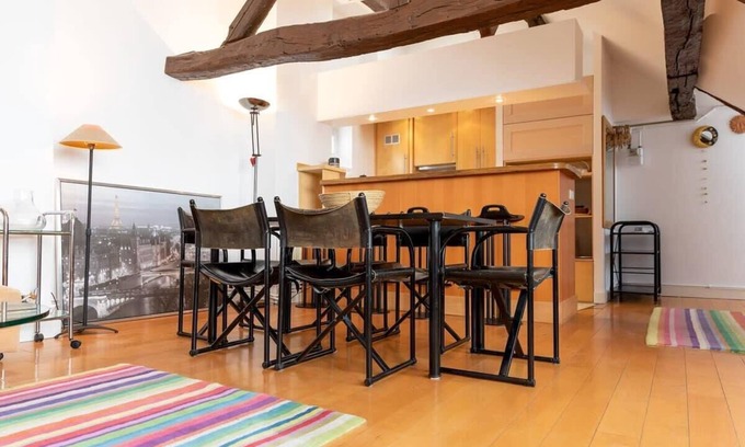 Quartier de la Place-Vendome Apartment | Bright Orange Vendome 1-Bedroom Near the Louvre