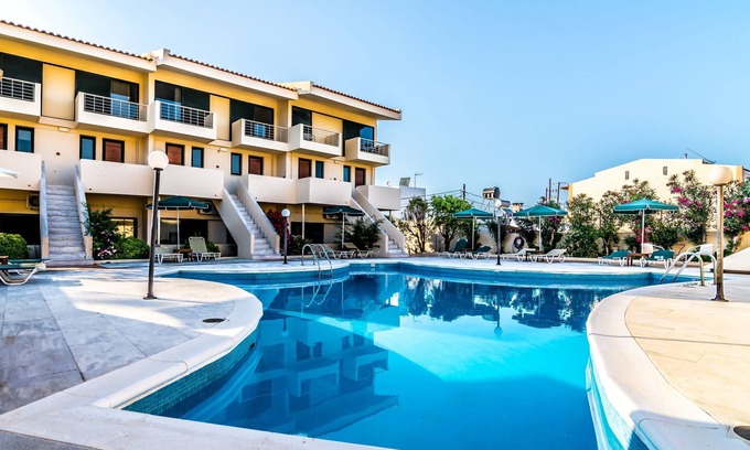 Stalos Apartment | Tranquil Orestis Studio: Oceanfront Stay with Pool & Kitchen
