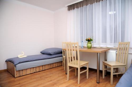 Ostrow Mazowiecka Hotel | Budget-Friendly ORION: Family and Kitchen Amenities Included
