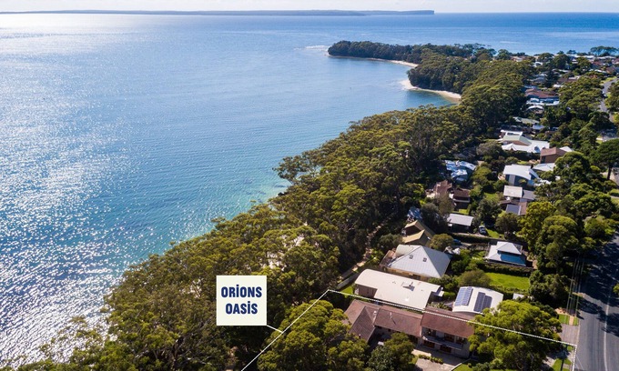 Vincentia House | Orions Ultimate Oasis: Beachfront Retreat with Spa & Pool