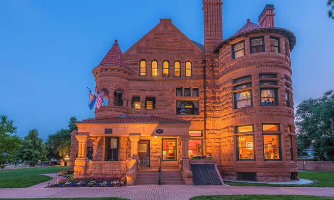 Pueblo House | Experience Orman Mansion: Guest Rated 9.6 with Family Amenities