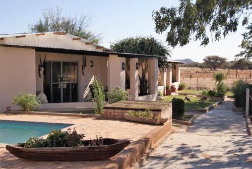 Damaraland Apartment | Experience Orpheus Inn: Pool, Kitchen & Top Guest Ratings