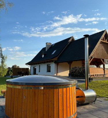 Gniew House | Osada Rzym: Oceanfront Retreat with Hot Tub & Pet-Friendly Stay