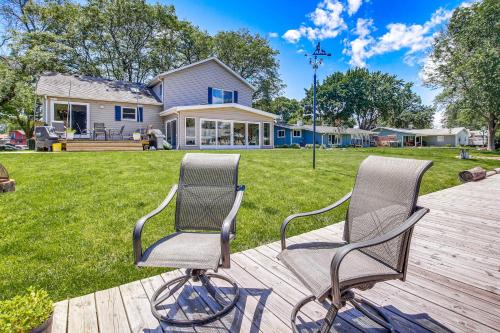 Oshkosh House | Oshkosh Canal-Front Home with Sunroom & Pet-Friendly Perks