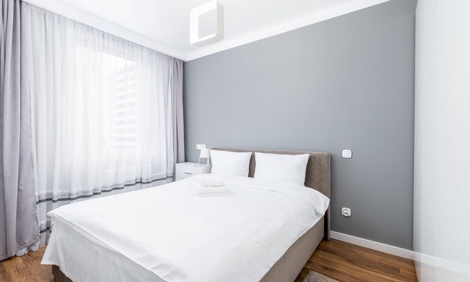 Czyzyny Apartment | Modern Apartment at Osiedle Avia: Family-Friendly Comfort