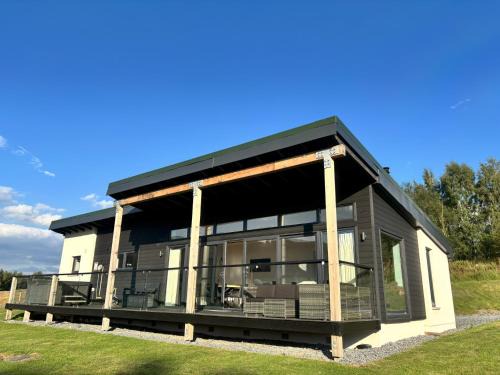 Aberfeldy House | Osprey View Lodge with Hot Tub - Child-Friendly Retreat