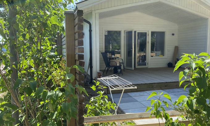 Timmernabben Cottage | Discover Ostkustens Riviera: Poolside Oceanfront Retreat
