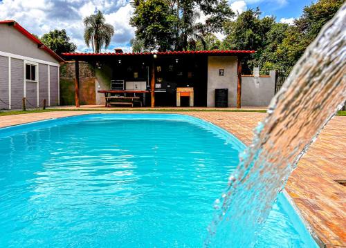Ibiuna House | Inviting Ibiuna Retreat with Pool, BBQ & WiFi Access