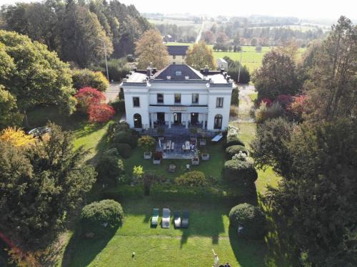Couvin House | Discover Otium: Family-Friendly Getaway with Hot Tub