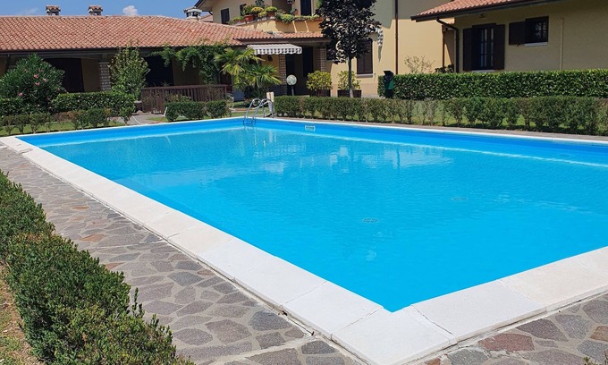 Lugana Apartment | Inviting Summer House with Ocean View in Sirmione