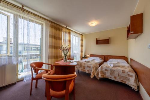 Darlowo Resort | Discover OW Carbo Dąbki: Nature Retreat by Lake and Forest