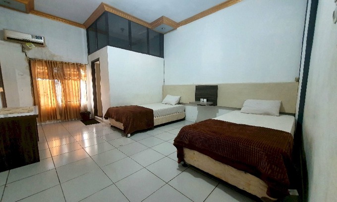 Sarolangun Hotel | Budget-Friendly Stay at OYO 91097 Hotel Atika with Breakfast