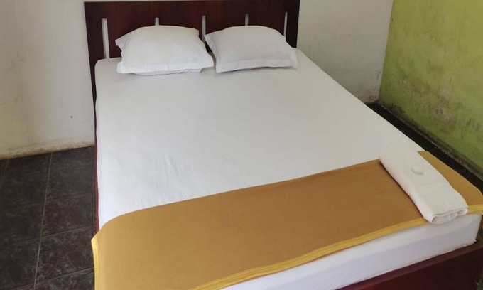 Sei Pinang Hotel | Budget-Friendly Stay at OYO 93520 Wisma Haji Bunbun