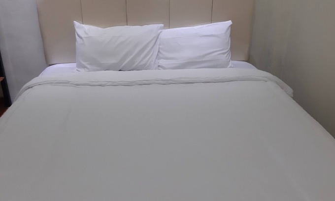 Sei Pinang Hotel | Budget-Friendly Stay at OYO 93521 Wisma Flamboyan
