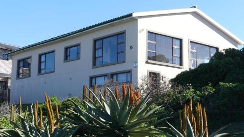 Cape Saint Francis House | Explore Oyster Catcher: Oceanfront Stay with Spa & Breakfast