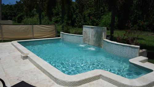 Aguadilla Apartment | Pet-Friendly Getaway at Ozean Apartment with Pool Access