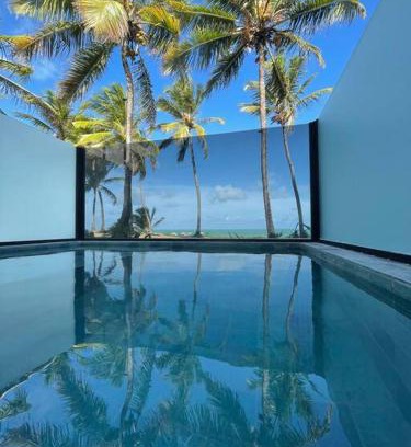 Jardim Oceania Apartment | Beachfront Escape with Private Pool and Ocean Views