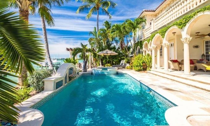 Coury House | Oceanfront 5-Bedroom Home with Private Pool & Dockage