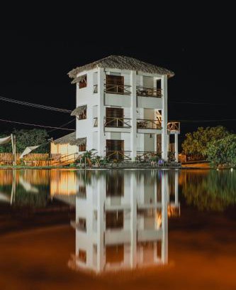 Santo Amaro do Maranhao Cabin | Inviting Pacas Suítes Casa & Chalés: Pet-Friendly Stay