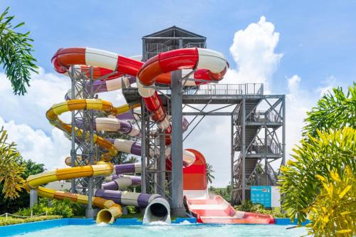 San Antonio Resort | Discover Pacific Islands Club Saipan: Family-Friendly Beach Retreat
