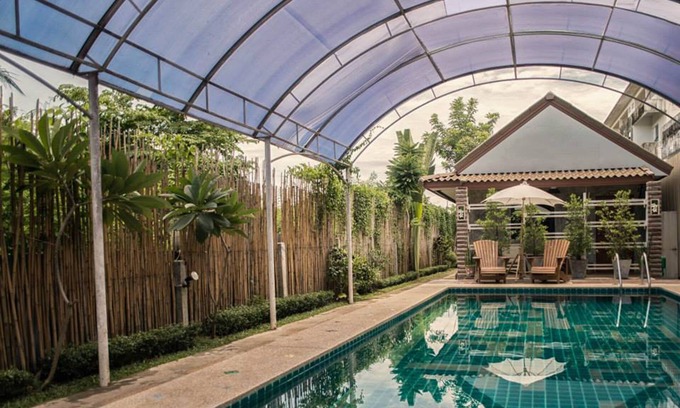 Thani Hotel | Inviting Pai Sukhothai Resort: Pool, Dining & Family Fun