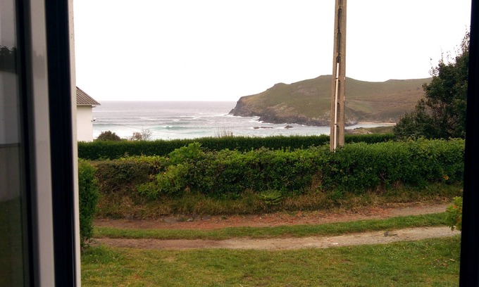 Valdovino House | Charming Painted Beach House in Pantín with Family Amenities