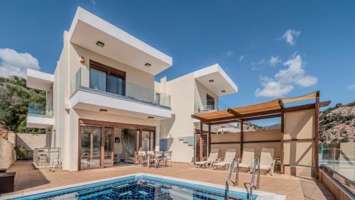 Palaiokastro House | Relax at Palaiokastro Villas & Suites with Oceanfront Views