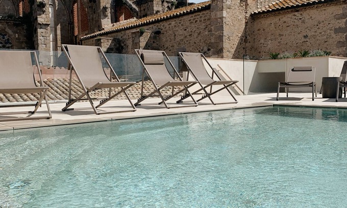 Castello d'Empuries Hotel | Unforgettable Stay at Palau Macelli: 4-Star Excellence