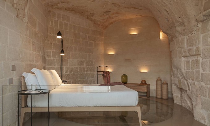 Sasso Barisano Hotel | Experience Palazzo degli Abati: Rated 9.8 with Spa & Family Comfort