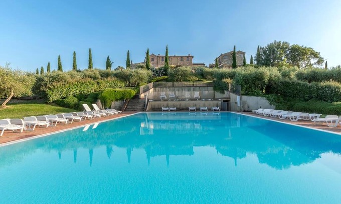 Asciano Apartment | Palazzo Monaci: Poolside Escape in Crete Senesi