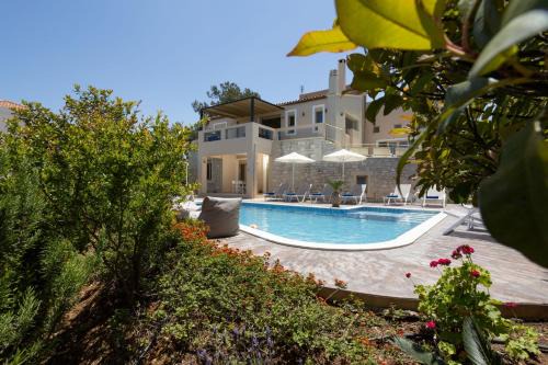 Roussospiti Villa | Elegant Palladio Villa: Oceanfront Bliss with Top Ratings