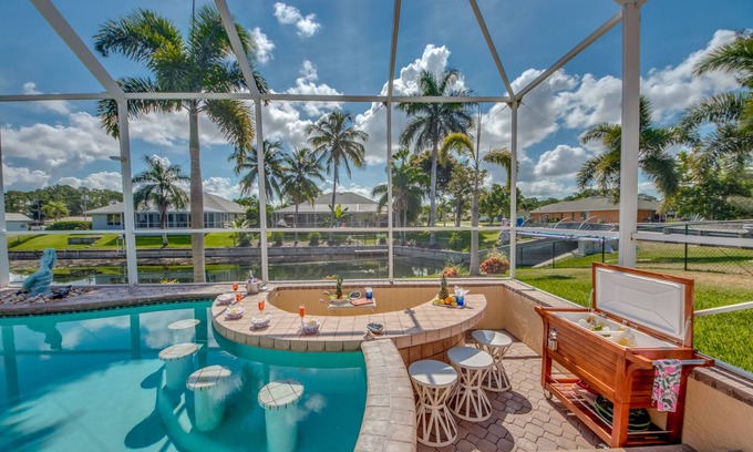 Trafalgar House | Paradise Awaits at Palm Breeze - Swim Up to the Bar!