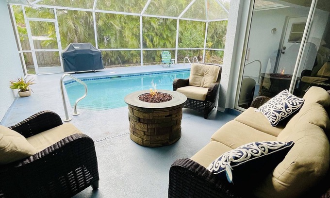 San Carlos Park House | Escape to Palm Breezes: Pet-Friendly, Poolside Retreat!