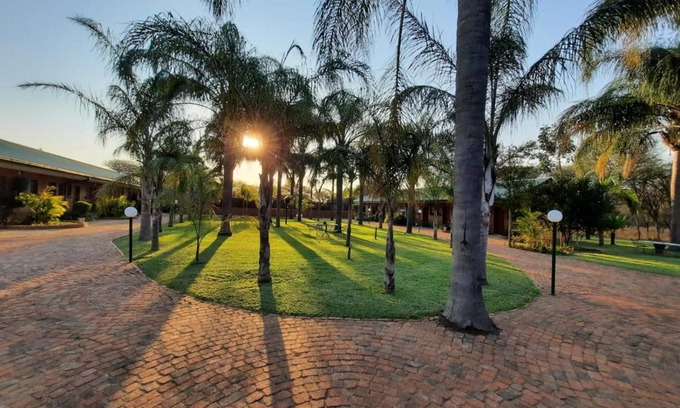 Makhado House | Discover Palm Haven Guesthouse with Pool & Pet-Friendly Stay