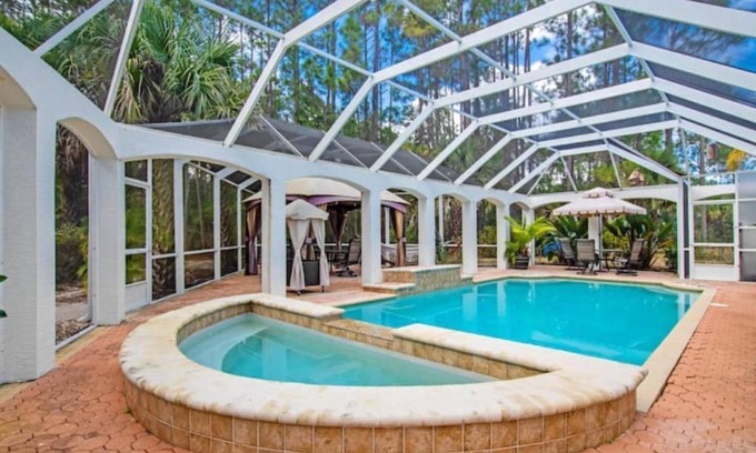 Palm Coast House | Indulge at Palm Oasis with Heated Pool & Ocean Views