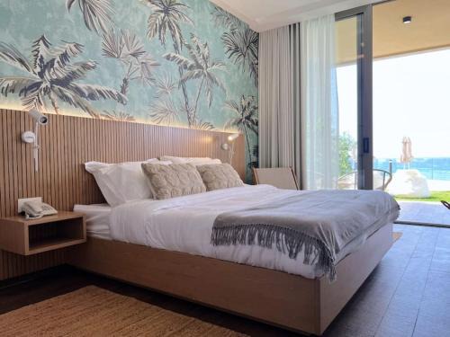 Kfardebian Hotel | Beachfront Exotic Room at Palm Paradise in Batroun