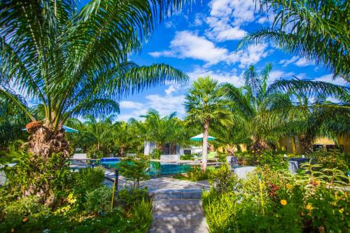 Pranburi Resort | Discover Palm Pran Resort: Family-Friendly with Pool Access
